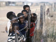 Children of Apartheid (Photo) Children of apartheid- This photo, taken in 1982, was shot in...