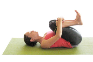 Knees to chest yoga 300x199 Yoga for Long Travel