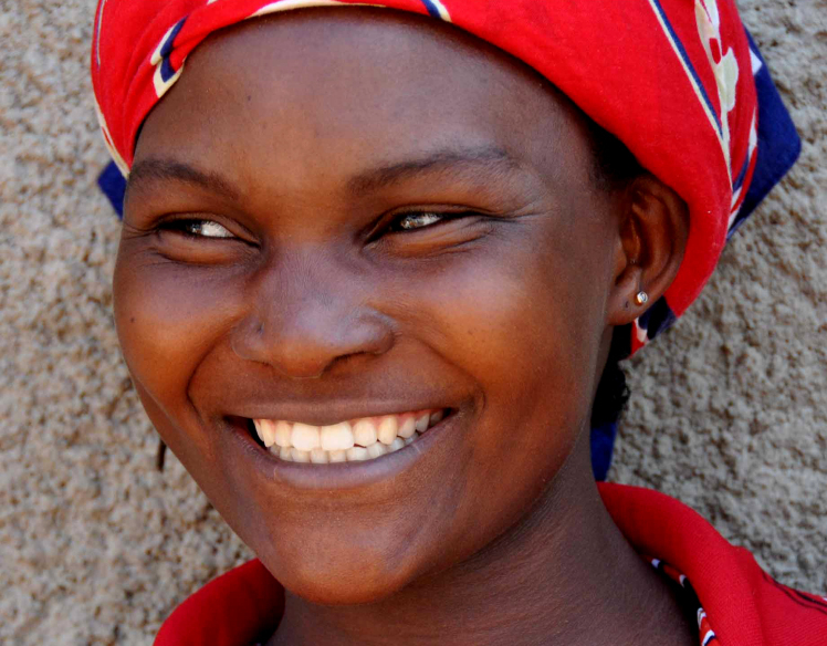 Ugandan woman photo via Shutterstock