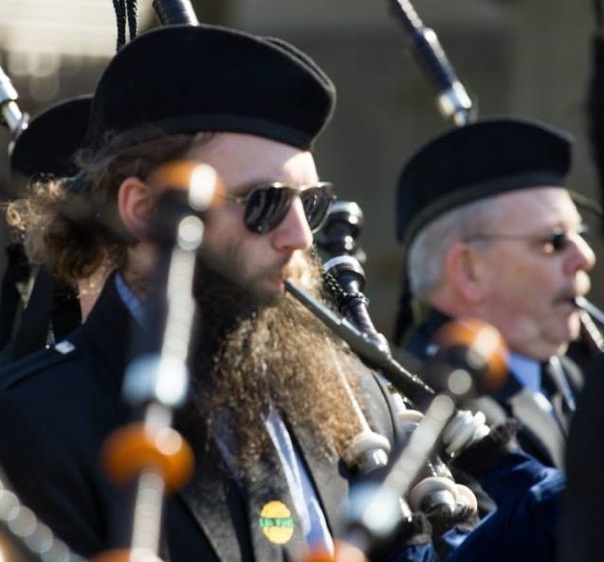 bagpipe player on a sunny St. Patrick’s Day