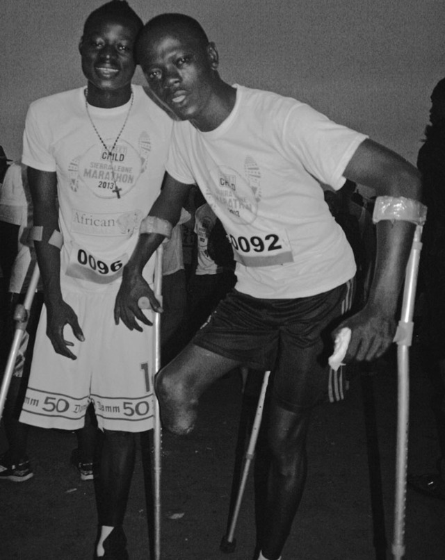 Players of the Sierra Leone National Amputee Football team line up to run the 5km run on the day of the Marathon, 2013. 