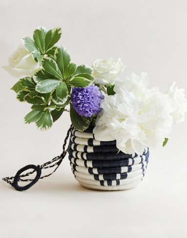 Hanging Flower Pot, $45 - Hand woven by the artisans of Imirasire in Rwanda out of sweetgrass locally grown in Rwanda. 