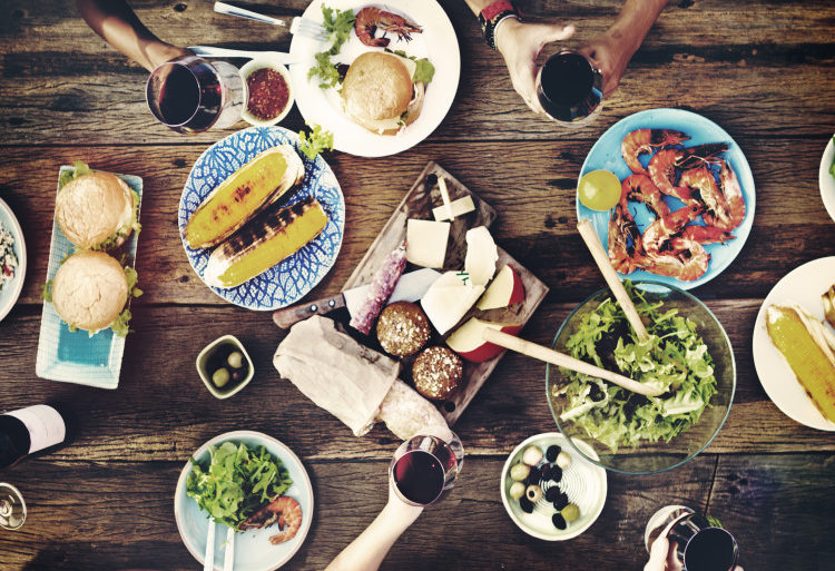 aerial view of table with food and hands